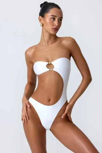 Costume intero a fascia con cut-out e decorazioni in perline Miami in bianco