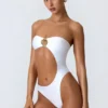 Costume intero a fascia con cut-out e decorazioni in perline Miami in bianco Costume intero a fascia con cut-out e decorazioni in perline Miami in bianco