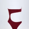Costume intero a fascia con cut-out e decorazioni in perline Miami in ciliegia scuro Costume intero a fascia con cut-out e decorazioni in perline Miami in ciliegia scuro