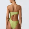 Costume intero a fascia con cut-out e decorazioni in perline Miami in verde pera Costume intero a fascia con cut-out e decorazioni in perline Miami in verde pera