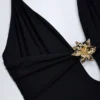 Costume intero Bahari con cut-out e dettagli metallici in nero Costume intero Bahari con cut-out e dettagli metallici in nero