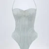 Costume intero Biarritz con scollo all’americana e cut-out a righe doppie color verde acqua Costume intero Biarritz con scollo all’americana e cut-out a righe doppie color verde acqua