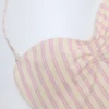 Costume intero Biarritz con scollo all’americana e cut-out in malva
