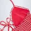 Costume intero con scollo all’americana e cut-out con volant Montjoi in quadretti rossi Costume intero con scollo all’americana e cut-out con volant Montjoi in quadretti rossi