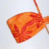 Costume intero con scollo all’americana e cut-out Maranta con stampa Orange Orchid Costume intero con scollo all’americana e cut-out Maranta con stampa Orange Orchid