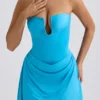 Efia Vestito corto drappeggiato in jersey slinky con gonna a trapezio in blu acqua Efia Vestito corto drappeggiato in jersey slinky con gonna a trapezio in blu acqua