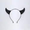 Fascia per capelli Vixena Devil Horns in nero Fascia per capelli Vixena Devil Horns in nero