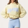 Felpa con cappuccio oversize con applicazione in giallo limone Felpa con cappuccio oversize con applicazione in giallo limone