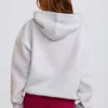Felpa con cappuccio oversize con applicazione in grigio Felpa con cappuccio oversize con applicazione in grigio