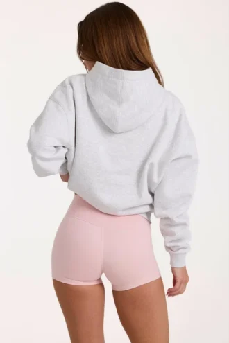 Felpa con cappuccio oversize con applicazione in grigio melange