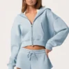 Felpa con cappuccio oversize con zip in blu polvere Felpa con cappuccio oversize con zip in blu polvere