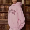 Felpa con cappuccio oversize ricamata in rosa cipria Felpa con cappuccio oversize ricamata in rosa cipria