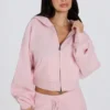 Felpa corta con cappuccio e zip in morbida maglia rosa tenue
