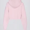 Felpa corta con cappuccio e zip in morbida maglia rosa tenue
