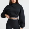 Felpa corta con cappuccio in felpa di cotone elasticizzata, colore nero Felpa corta con cappuccio in felpa di cotone elasticizzata, colore nero