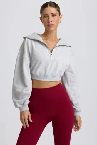 Felpa corta con zip a un quarto in grigio melange