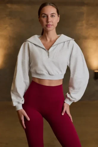 Felpa corta con zip a un quarto in grigio melange