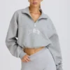 Felpa corta con zip a un quarto in grigio melange