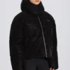 Giacca da sci oversize corta impermeabile in nero leopardato Giacca da sci oversize corta impermeabile in nero leopardato