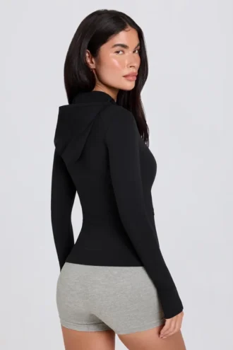 Giacca intermedia con cappuccio Soft Active in nero