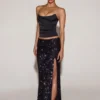 Gonna lunga a vita media con spacco sulla coscia e decorazioni Nevara in nero e viola