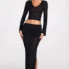 Top Liah in jersey trasparente con scollo profondo e maniche lunghe, colore nero Top Liah in jersey trasparente con scollo profondo e maniche lunghe, colore nero