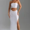 Gonna lunga Pelagia con spacco sulla coscia e vita a V decorata in bianco Gonna lunga Pelagia con spacco sulla coscia e vita a V decorata in bianco
