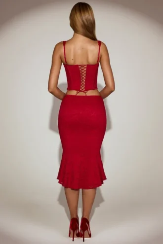 Gonna midi svasata in pizzo color corallo con vita media in rosso intenso
