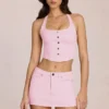 Gonna-pantaloncino a vita bassa in denim Virella in rosa fiorito Gonna-pantaloncino a vita bassa in denim Virella in rosa fiorito