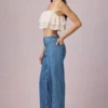 Jeans a vita media e gamba a campana Bobbi in lavaggio blu medio Jeans a vita media e gamba a campana Bobbi in lavaggio blu medio