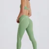 Leggings Soft Active con parte anteriore intrecciata in verde