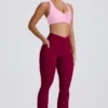 Leggings svasati Soft Active con tasche e vita a V in bordeaux Leggings svasati Soft Active con tasche e vita a V in bordeaux