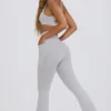 Leggings svasati Soft Active con tasche e vita a V in grigio Leggings svasati Soft Active con tasche e vita a V in grigio