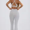 Leggings svasati Soft Active con tasche e vita a V in grigio Leggings svasati Soft Active con tasche e vita a V in grigio