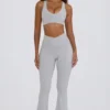 Leggings svasati Soft Active con tasche e vita a V in grigio Leggings svasati Soft Active con tasche e vita a V in grigio
