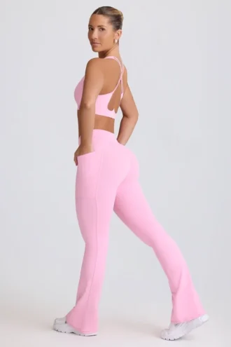Leggings svasati Soft Active con vita a V e tasche in rosa baby