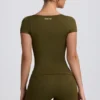 Maglietta senza cuciture Super Sculpt in verde scuro Maglietta senza cuciture Super Sculpt in verde scuro