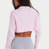 Maglione corto in maglia a costine con zip a un quarto in rosa cipria Maglione corto in maglia a costine con zip a un quarto in rosa cipria