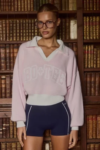 Maglione oversize in jersey di cotone con scollo a V in rosa cipria