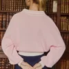 Maglione oversize in jersey di cotone con scollo a V in rosa cipria Maglione oversize in jersey di cotone con scollo a V in rosa cipria