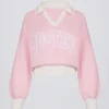 Maglione oversize in jersey di cotone con scollo a V in rosa cipria Maglione oversize in jersey di cotone con scollo a V in rosa cipria