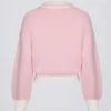 Maglione oversize in jersey di cotone con scollo a V in rosa cipria Maglione oversize in jersey di cotone con scollo a V in rosa cipria