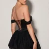 Meredith Abito corto a balze con corpetto a corsetto e spalle scoperte in nero Meredith Abito corto a balze con corpetto a corsetto e spalle scoperte in nero