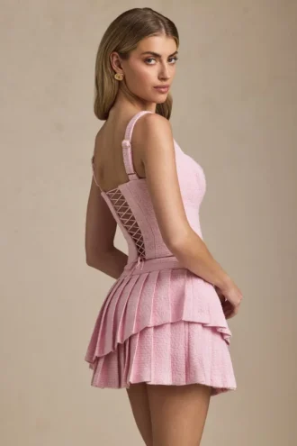 Mini gonna a pieghe a strati a vita bassa Nada in rosa tenue