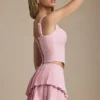 Mini gonna a pieghe a strati a vita bassa Nada in rosa tenue Mini gonna a pieghe a strati a vita bassa Nada in rosa tenue