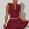 Mini gonna a pieghe a strati a vita bassa Nada in rosso vino Mini gonna a pieghe a strati a vita bassa Nada in rosso vino