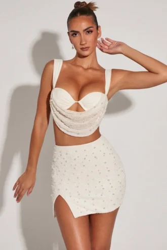 Mini gonna a vita alta con spacco sulla coscia Belle Ile in bianco