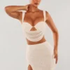 Mini gonna a vita alta con spacco sulla coscia Belle Ile in bianco Mini gonna a vita alta con spacco sulla coscia Belle Ile in bianco