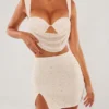 Mini gonna a vita alta con spacco sulla coscia Belle Ile in bianco Mini gonna a vita alta con spacco sulla coscia Belle Ile in bianco