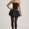 Mini gonna a vita media con orlo a palloncino Clemmy in nero Mini gonna a vita media con orlo a palloncino Clemmy in nero